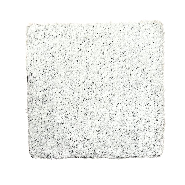 Muestra césped artificial blanco