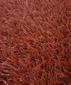 césped artificial marrón