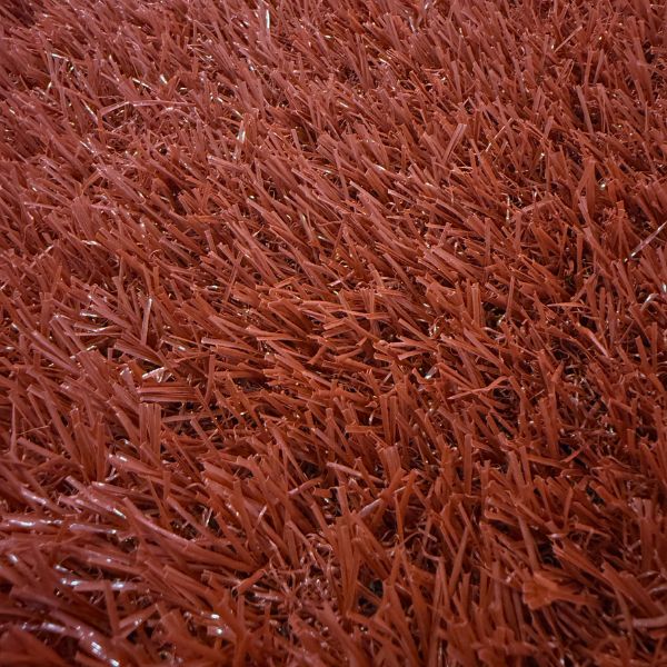 césped artificial marrón